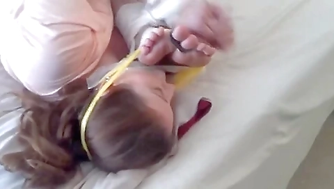 Two Women Tied Together Feet To Face Two Women Tied Together Feet To Face