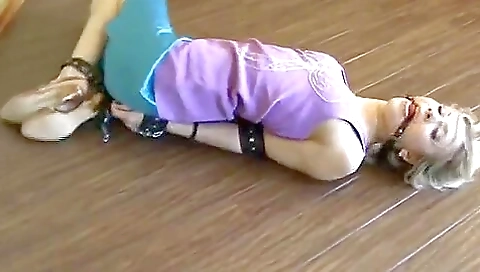 Blond Hogtied And Ball Gagged On The Floor