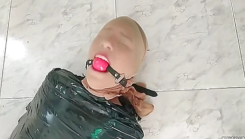 Tape Mummified Girl Pantyhose Hooded And Ball Gagged Tape Mummified Girl Pantyhose Hooded And Ball Gagged