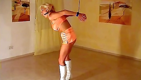 Tied And Ball Gagged In White Boots Tied And Ball Gagged In White Boots
